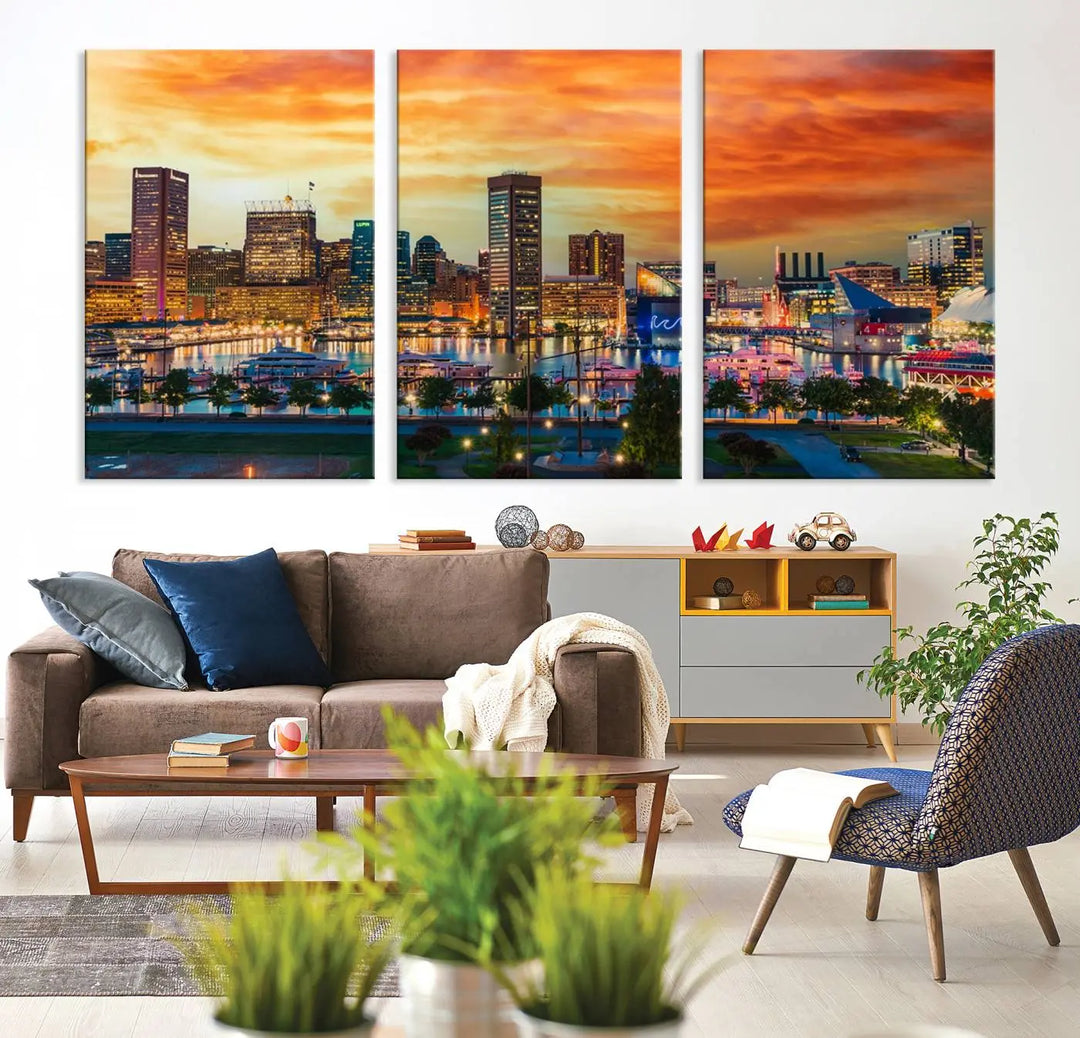 The living room features the Baltimore City Lights Sunset Orange Skyline Cityscape View Wall Art Canvas Print. This vibrant skyline masterpiece is professionally hand-assembled on museum-quality canvases and treated with a UV-protective coating for lasting beauty.