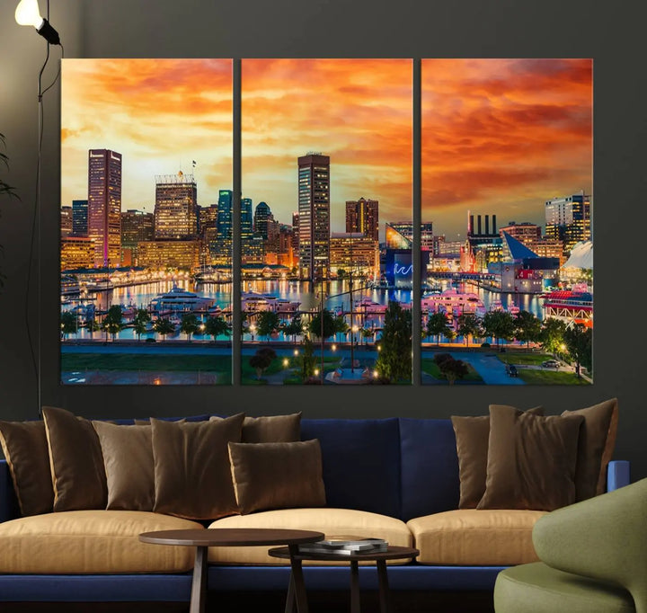 The living room features the Baltimore City Lights Sunset Orange Skyline Cityscape View Wall Art Canvas Print. This vibrant skyline masterpiece is professionally hand-assembled on museum-quality canvases and treated with a UV-protective coating for lasting beauty.