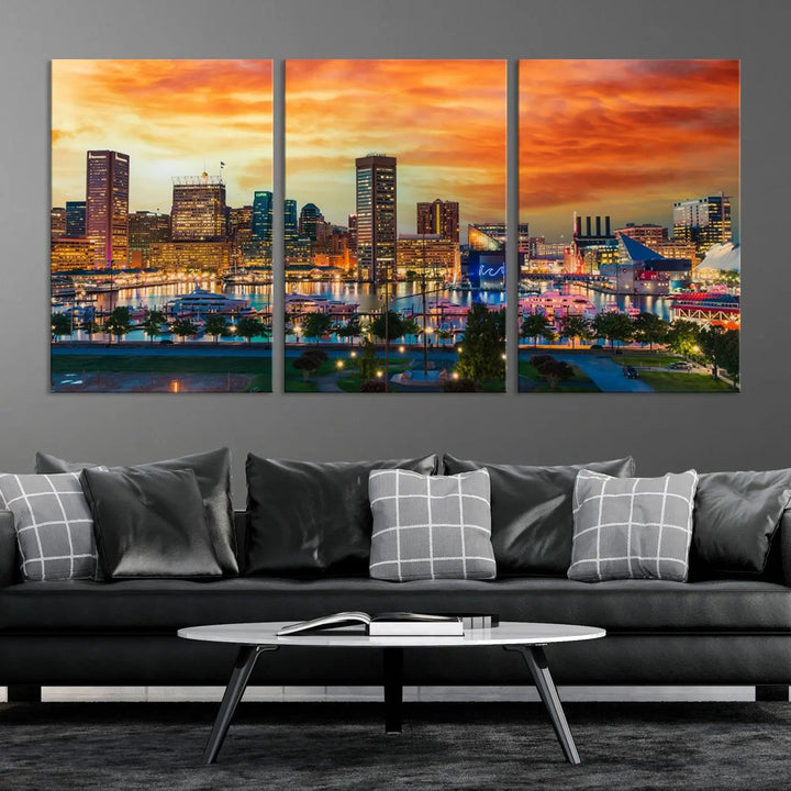 The living room features the Baltimore City Lights Sunset Orange Skyline Cityscape View Wall Art Canvas Print. This vibrant skyline masterpiece is professionally hand-assembled on museum-quality canvases and treated with a UV-protective coating for lasting beauty.