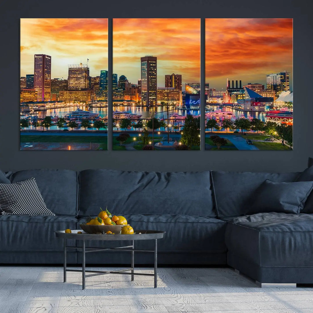 The living room features the Baltimore City Lights Sunset Orange Skyline Cityscape View Wall Art Canvas Print. This vibrant skyline masterpiece is professionally hand-assembled on museum-quality canvases and treated with a UV-protective coating for lasting beauty.