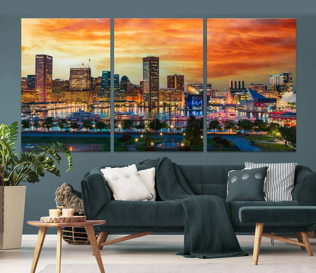 The living room features the Baltimore City Lights Sunset Orange Skyline Cityscape View Wall Art Canvas Print. This vibrant skyline masterpiece is professionally hand-assembled on museum-quality canvases and treated with a UV-protective coating for lasting beauty.