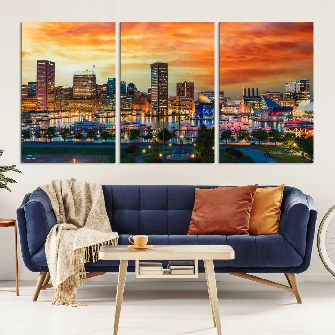 The living room features the Baltimore City Lights Sunset Orange Skyline Cityscape View Wall Art Canvas Print. This vibrant skyline masterpiece is professionally hand-assembled on museum-quality canvases and treated with a UV-protective coating for lasting beauty.