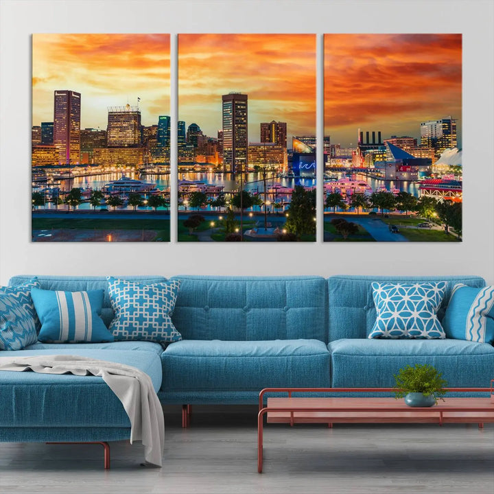 The living room features the Baltimore City Lights Sunset Orange Skyline Cityscape View Wall Art Canvas Print. This vibrant skyline masterpiece is professionally hand-assembled on museum-quality canvases and treated with a UV-protective coating for lasting beauty.