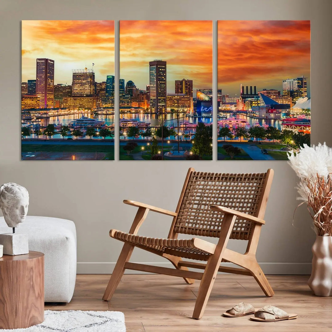 The living room features the Baltimore City Lights Sunset Orange Skyline Cityscape View Wall Art Canvas Print. This vibrant skyline masterpiece is professionally hand-assembled on museum-quality canvases and treated with a UV-protective coating for lasting beauty.