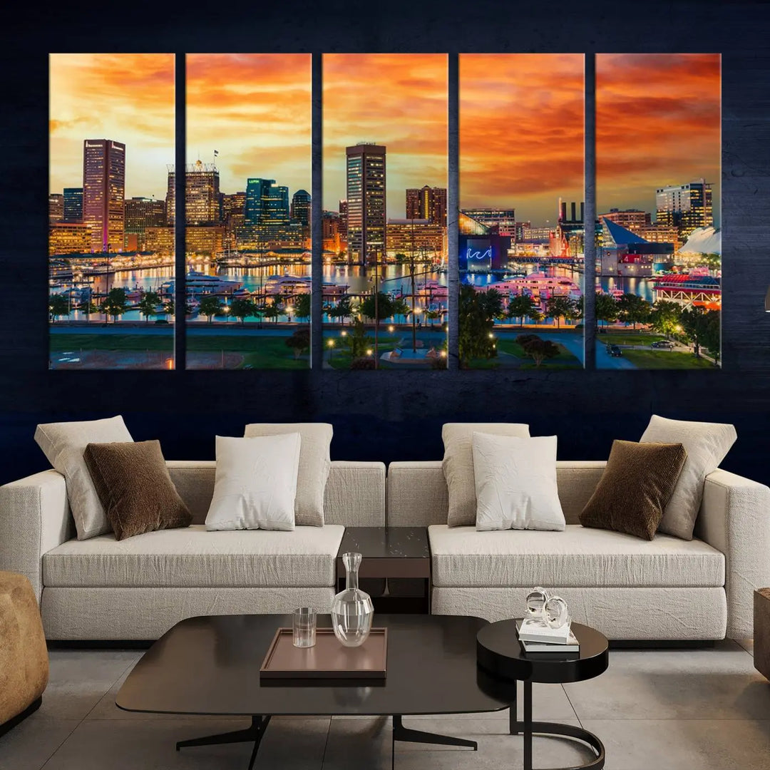 The living room features the Baltimore City Lights Sunset Orange Skyline Cityscape View Wall Art Canvas Print. This vibrant skyline masterpiece is professionally hand-assembled on museum-quality canvases and treated with a UV-protective coating for lasting beauty.