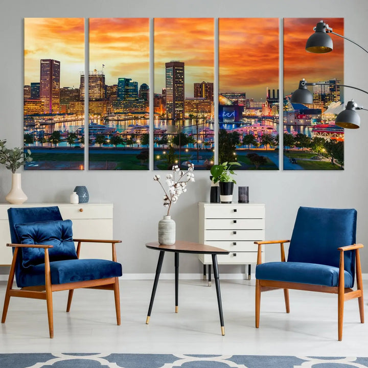 The living room features the Baltimore City Lights Sunset Orange Skyline Cityscape View Wall Art Canvas Print. This vibrant skyline masterpiece is professionally hand-assembled on museum-quality canvases and treated with a UV-protective coating for lasting beauty.