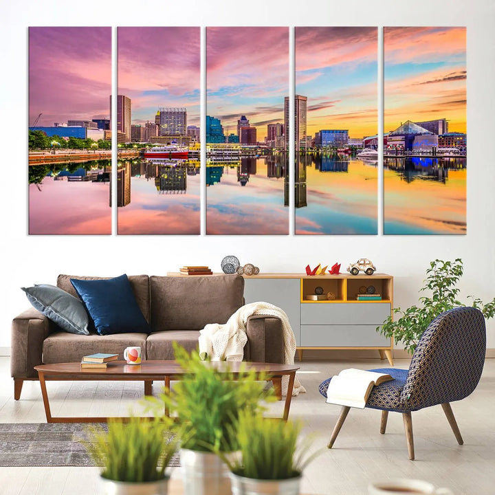 The Baltimore City Lights Sunset Pink and Orange Skyline canvas print depicts a vibrant cityscape at sunset, with skyscrapers reflecting in a calm river on museum-quality canvas. Each piece is gallery wrapped and features a UV-protective coating.