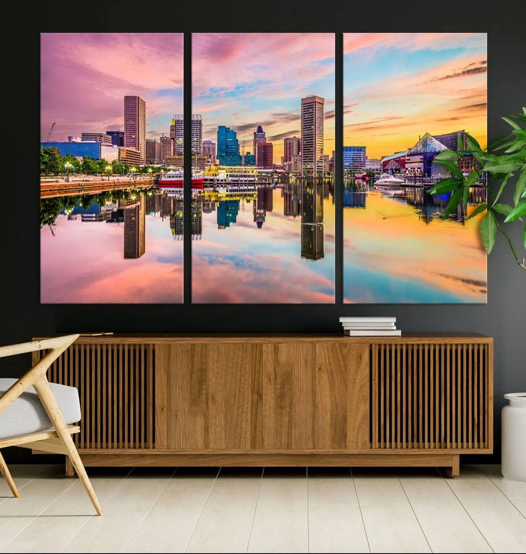 Transform your living room with the captivating elegance of the Baltimore City Lights Sunset Pink and Orange Skyline Cityscape View Wall Art Canvas Print. This triptych wall art features a breathtaking cityscape at sunset, beautifully reflected over water. Crafted with museum-quality canvases and UV-protective coating, it's ready to hang.