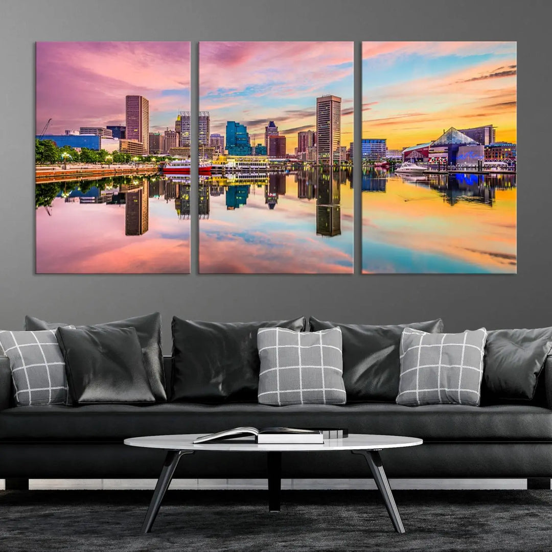 Transform your living room with the captivating elegance of the Baltimore City Lights Sunset Pink and Orange Skyline Cityscape View Wall Art Canvas Print. This triptych wall art features a breathtaking cityscape at sunset, beautifully reflected over water. Crafted with museum-quality canvases and UV-protective coating, it's ready to hang.