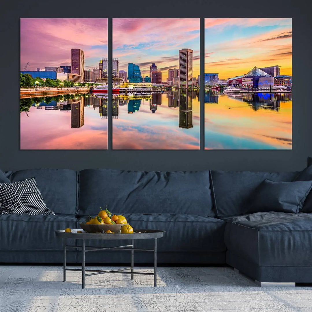 Transform your living room with the captivating elegance of the Baltimore City Lights Sunset Pink and Orange Skyline Cityscape View Wall Art Canvas Print. This triptych wall art features a breathtaking cityscape at sunset, beautifully reflected over water. Crafted with museum-quality canvases and UV-protective coating, it's ready to hang.