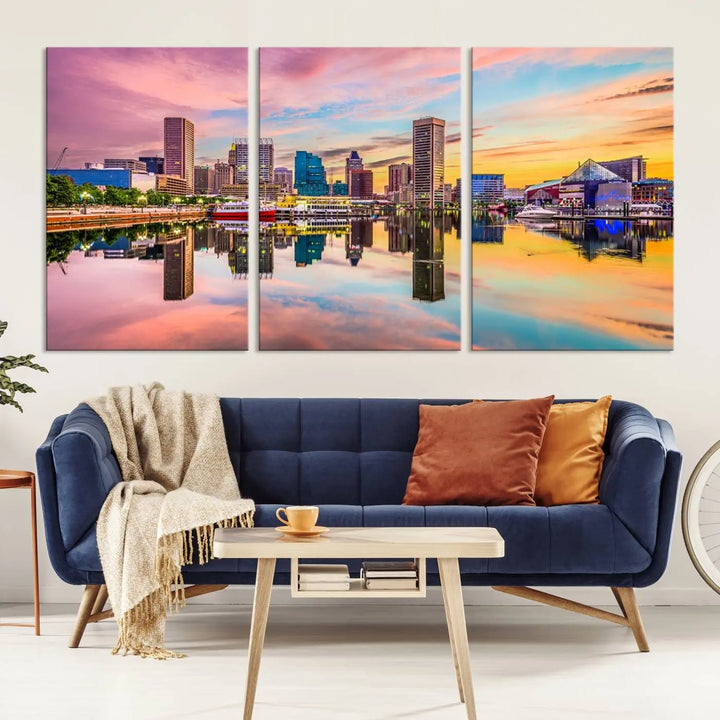 Transform your living room with the captivating elegance of the Baltimore City Lights Sunset Pink and Orange Skyline Cityscape View Wall Art Canvas Print. This triptych wall art features a breathtaking cityscape at sunset, beautifully reflected over water. Crafted with museum-quality canvases and UV-protective coating, it's ready to hang.