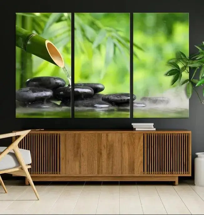 A three-panel Bamboo Water Stones Japanese Wall Art Canvas Print is elegantly displayed above the sofa.