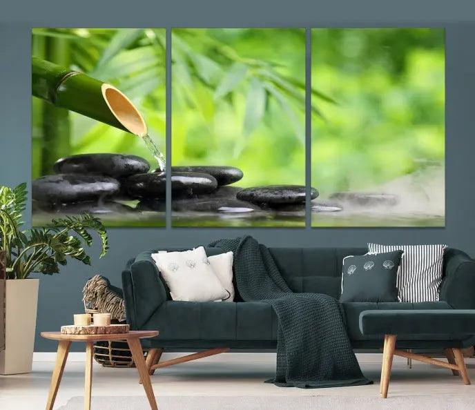 A three-panel Bamboo Water Stones Japanese Wall Art Canvas Print is elegantly displayed above the sofa.