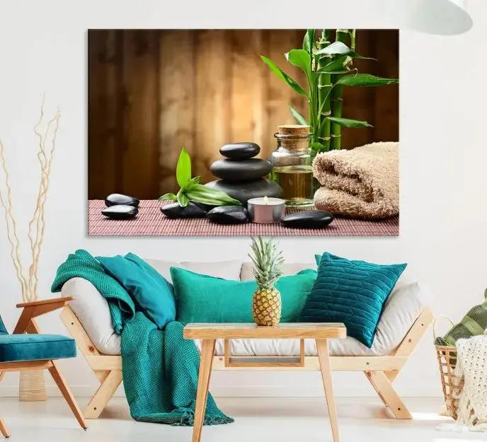 An inspiring Wall Art Canvas Print depicts a tranquil spa scene with Zen Stones and bamboo against the backdrop of a cozy living room.