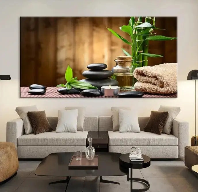 An inspiring Wall Art Canvas Print depicts a tranquil spa scene with Zen Stones and bamboo against the backdrop of a cozy living room.