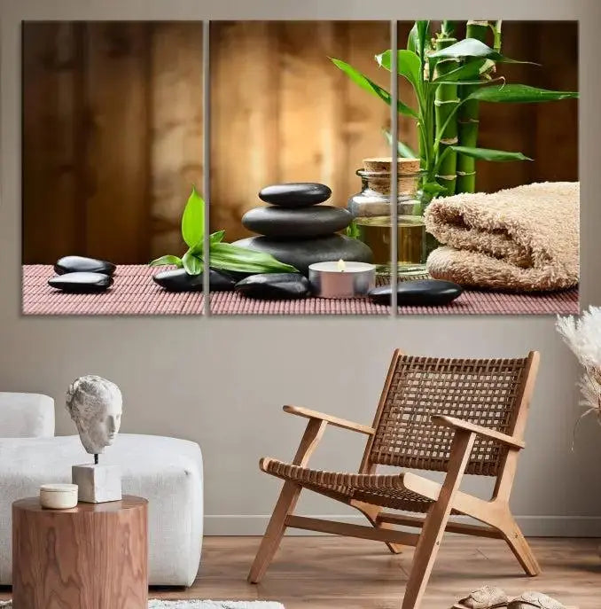 An inspiring Wall Art Canvas Print depicts a tranquil spa scene with Zen Stones and bamboo against the backdrop of a cozy living room.