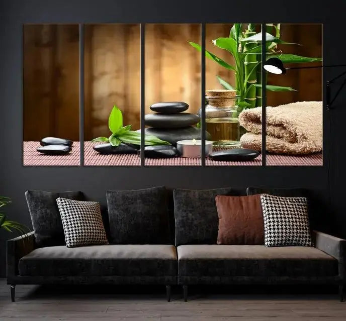 An inspiring Wall Art Canvas Print depicts a tranquil spa scene with Zen Stones and bamboo against the backdrop of a cozy living room.