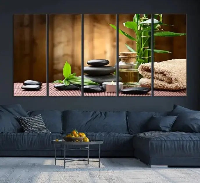 An inspiring Wall Art Canvas Print depicts a tranquil spa scene with Zen Stones and bamboo against the backdrop of a cozy living room.