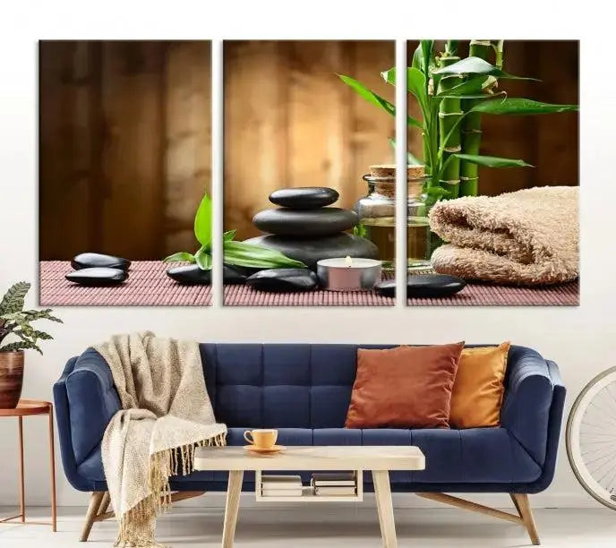 An inspiring Wall Art Canvas Print depicts a tranquil spa scene with Zen Stones and bamboo against the backdrop of a cozy living room.