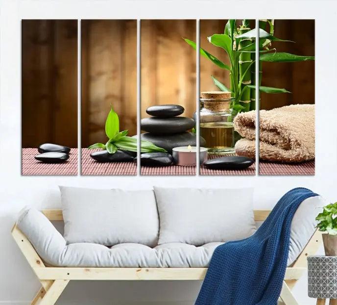 An inspiring Wall Art Canvas Print depicts a tranquil spa scene with Zen Stones and bamboo against the backdrop of a cozy living room.