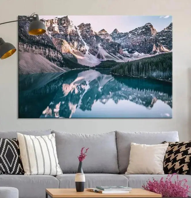 A stunning triptych titled "Banff Nal Park Wall Art Canvas Print," featuring a serene mountain lake, is crafted on museum-quality canvas with a UV-protective coating.