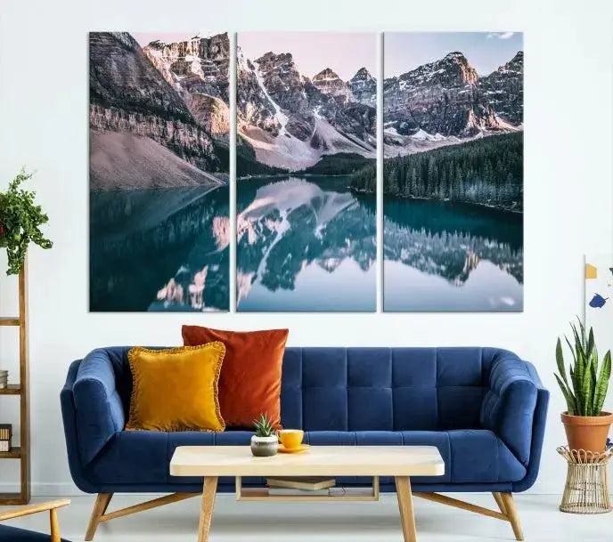 A stunning triptych titled "Banff Nal Park Wall Art Canvas Print," featuring a serene mountain lake, is crafted on museum-quality canvas with a UV-protective coating.