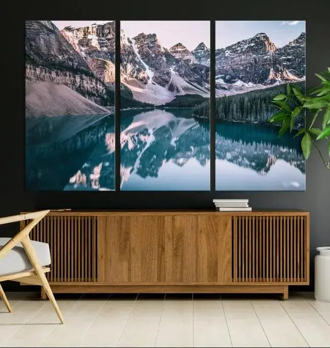 A stunning triptych titled "Banff Nal Park Wall Art Canvas Print," featuring a serene mountain lake, is crafted on museum-quality canvas with a UV-protective coating.