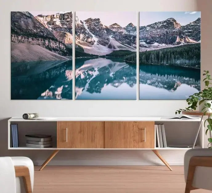 A stunning triptych titled "Banff Nal Park Wall Art Canvas Print," featuring a serene mountain lake, is crafted on museum-quality canvas with a UV-protective coating.