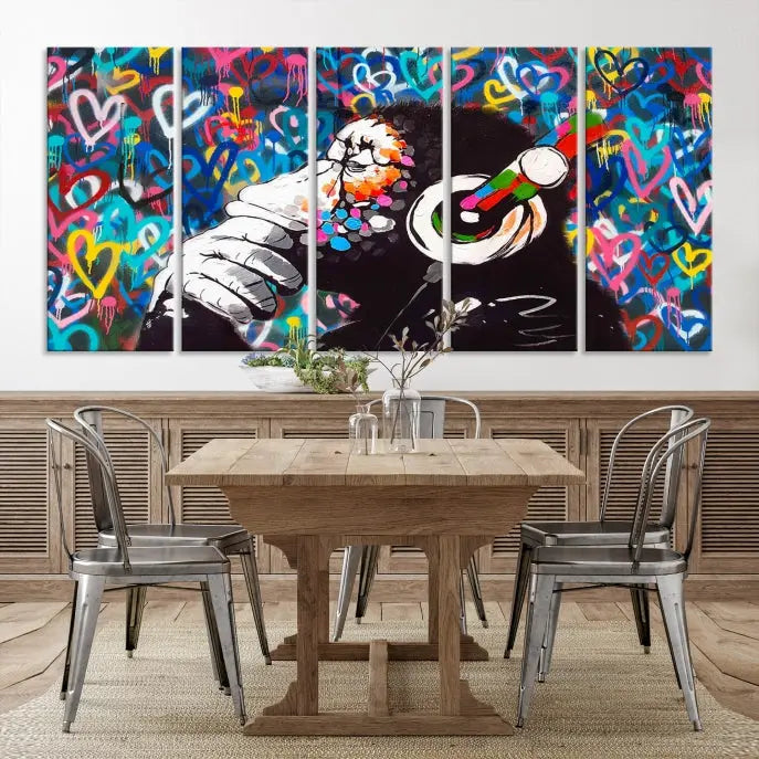 A triptych featuring the "Banksy Canvas Wall Art Thinking Monkey Canvas Art Print" showcases a chimp wearing headphones against a colorful heart-patterned background. Each museum-quality canvas is gallery wrapped and finished with a UV-protective coating to ensure lasting brilliance.