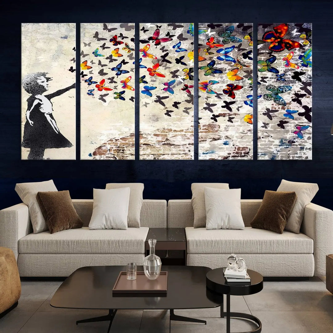 The Banksy Graffiti Wall Art Canvas Print, entitled 'Girl Releasing Vibrant Butterflies,' is a three-panel piece that is ready to hang.