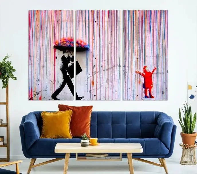 Introducing the Banksy Street Art Wall Art Canvas Print, a captivating piece featuring modern art of a man with an umbrella while a child reaches up through vibrant drips. Its premium canvas and gallery-quality finish make it an eye-catching addition to any space.