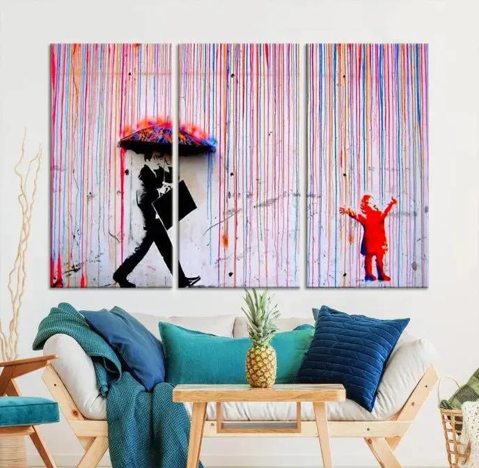 Introducing the Banksy Street Art Wall Art Canvas Print, a captivating piece featuring modern art of a man with an umbrella while a child reaches up through vibrant drips. Its premium canvas and gallery-quality finish make it an eye-catching addition to any space.