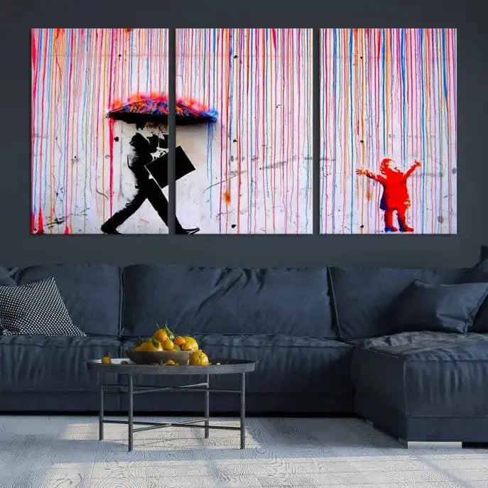 Introducing the Banksy Street Art Wall Art Canvas Print, a captivating piece featuring modern art of a man with an umbrella while a child reaches up through vibrant drips. Its premium canvas and gallery-quality finish make it an eye-catching addition to any space.