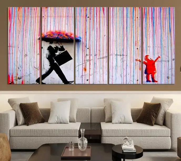 Introducing the Banksy Street Art Wall Art Canvas Print, a captivating piece featuring modern art of a man with an umbrella while a child reaches up through vibrant drips. Its premium canvas and gallery-quality finish make it an eye-catching addition to any space.