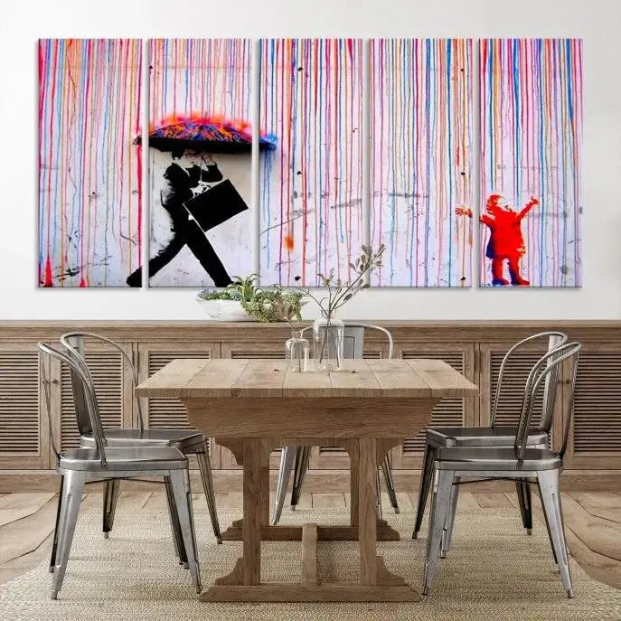 Introducing the Banksy Street Art Wall Art Canvas Print, a captivating piece featuring modern art of a man with an umbrella while a child reaches up through vibrant drips. Its premium canvas and gallery-quality finish make it an eye-catching addition to any space.