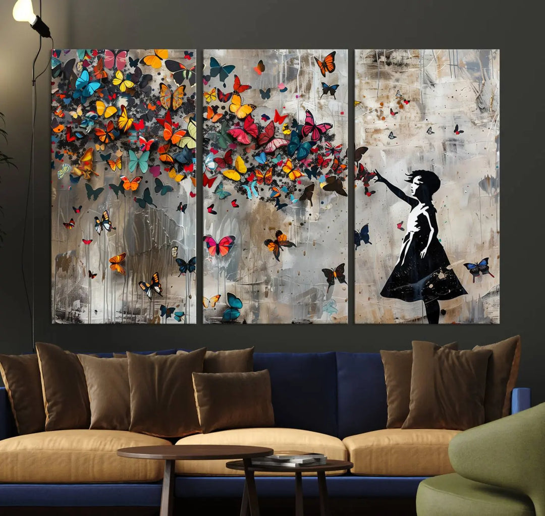 The Banksy Girl and Butterfly Explosion wall art canvas is a vibrant triptych that features textured depth, perfect for display.