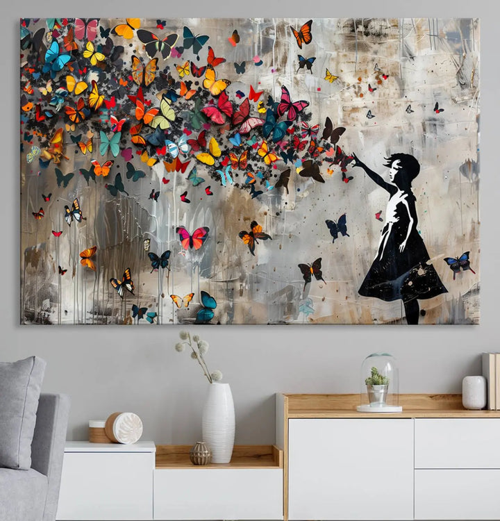 The Banksy Girl and Butterfly Explosion wall art canvas is a vibrant triptych that features textured depth, perfect for display.