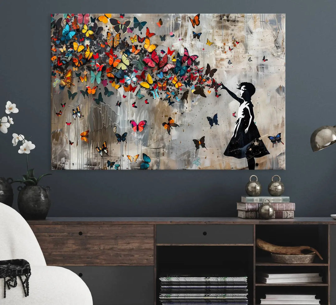 The Banksy Girl and Butterfly Explosion wall art canvas is a vibrant triptych that features textured depth, perfect for display.