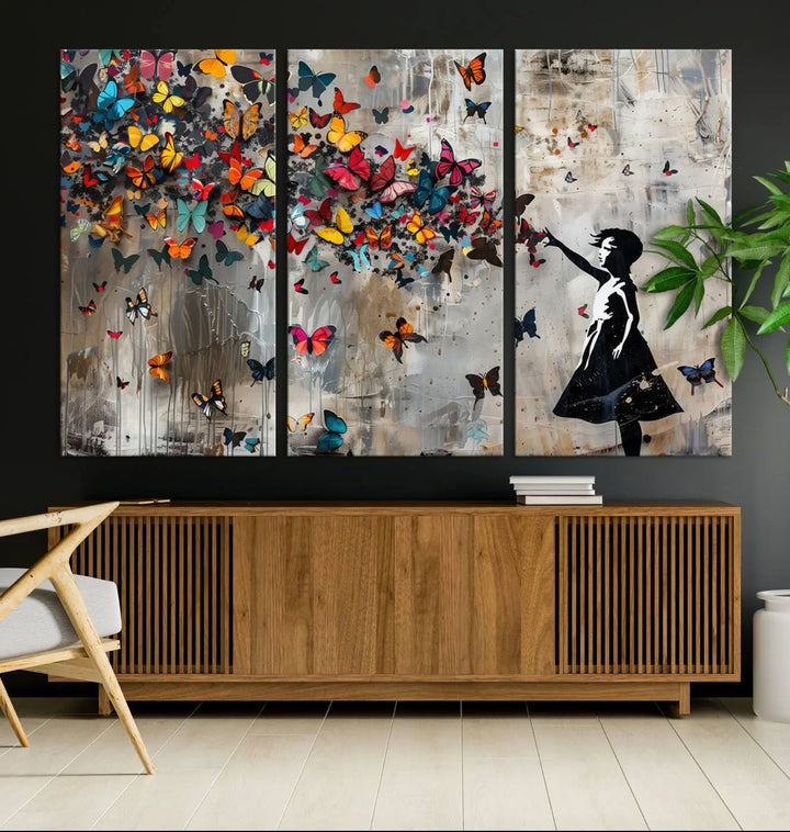 The Banksy Girl and Butterfly Explosion wall art canvas is a vibrant triptych that features textured depth, perfect for display.