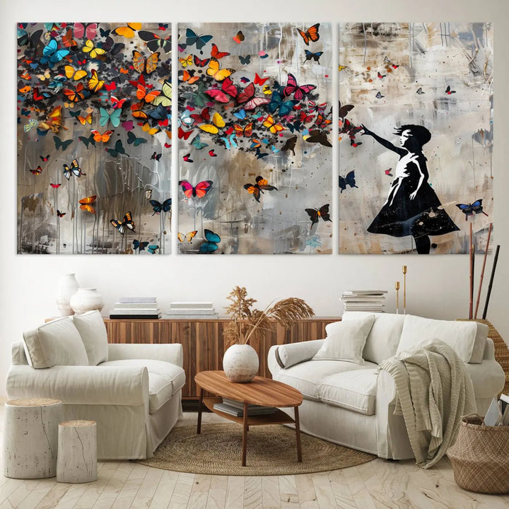 The Banksy Girl and Butterfly Explosion wall art canvas is a vibrant triptych that features textured depth, perfect for display.