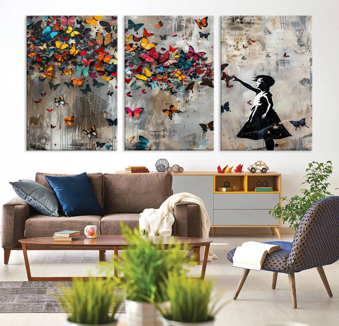 The Banksy Girl and Butterfly Explosion wall art canvas is a vibrant triptych that features textured depth, perfect for display.