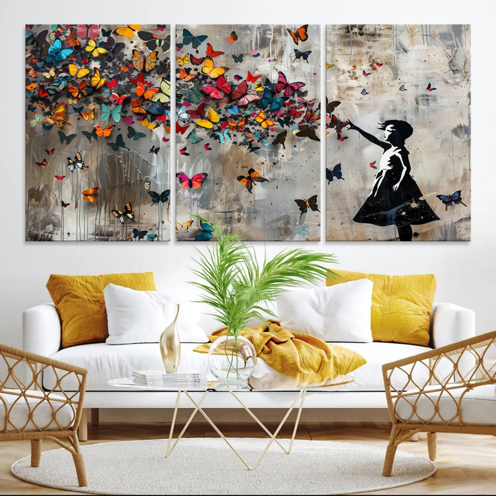 The Banksy Girl and Butterfly Explosion wall art canvas is a vibrant triptych that features textured depth, perfect for display.