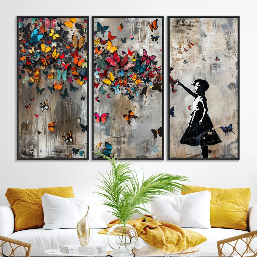 The Banksy Girl and Butterfly Explosion wall art canvas is a vibrant triptych that features textured depth, perfect for display.