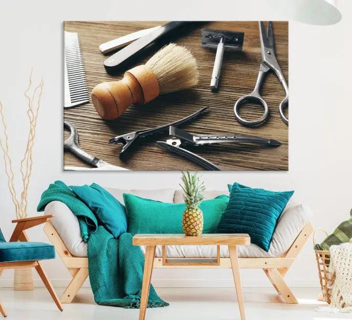 The Barber Tools Wall Art Canvas Print elegantly showcases the barbering profession with illustrations of tools like scissors, a brush, and a comb.