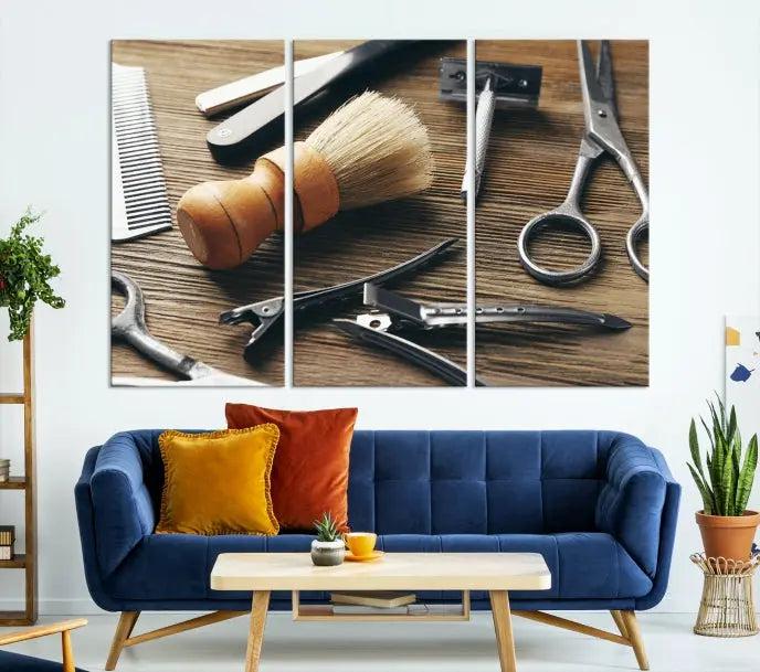 The Barber Tools Wall Art Canvas Print elegantly showcases the barbering profession with illustrations of tools like scissors, a brush, and a comb.