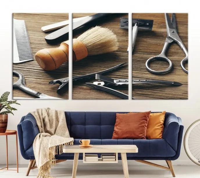 The Barber Tools Wall Art Canvas Print elegantly showcases the barbering profession with illustrations of tools like scissors, a brush, and a comb.