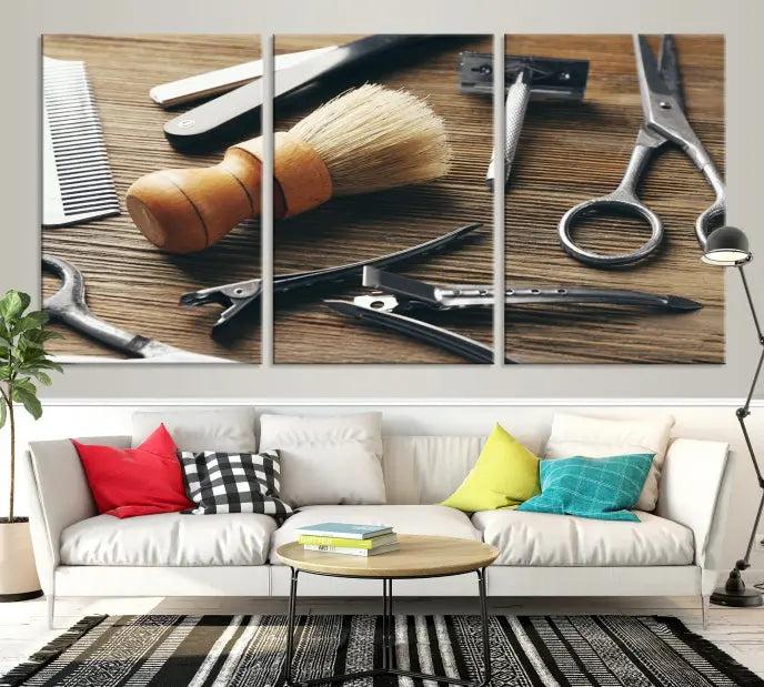 The Barber Tools Wall Art Canvas Print elegantly showcases the barbering profession with illustrations of tools like scissors, a brush, and a comb.