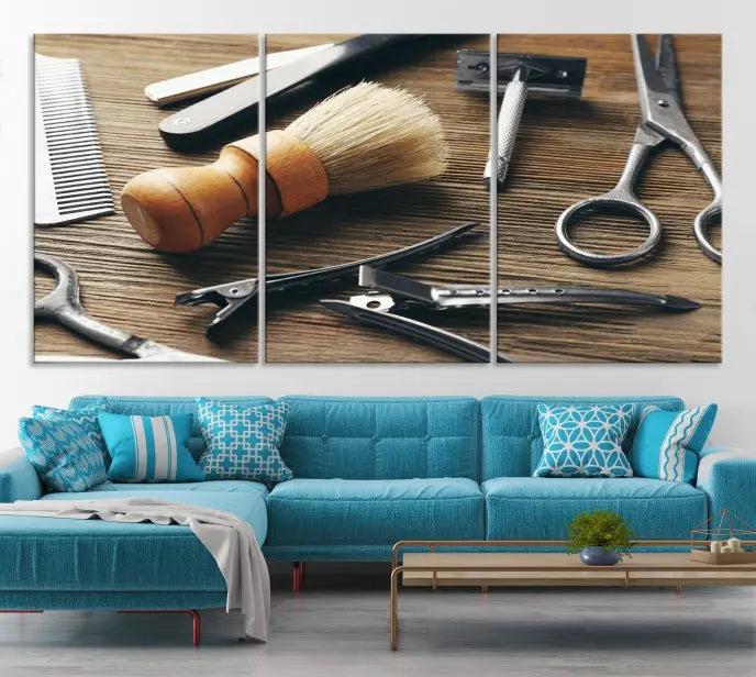 The Barber Tools Wall Art Canvas Print elegantly showcases the barbering profession with illustrations of tools like scissors, a brush, and a comb.