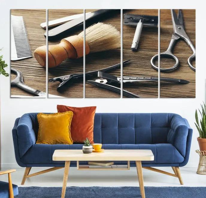 The Barber Tools Wall Art Canvas Print elegantly showcases the barbering profession with illustrations of tools like scissors, a brush, and a comb.