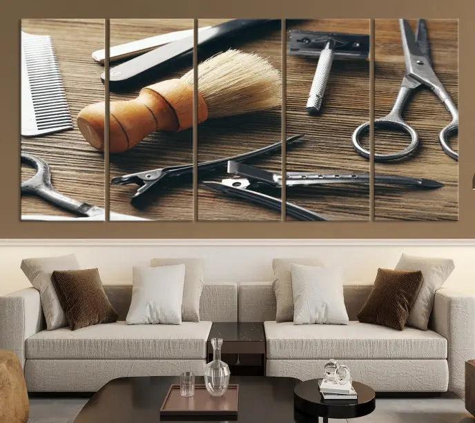 The Barber Tools Wall Art Canvas Print elegantly showcases the barbering profession with illustrations of tools like scissors, a brush, and a comb.